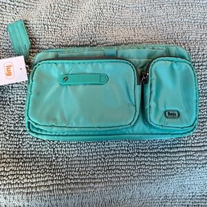 Lug Switcheroo Crossbody Bag
Color: Surf Teal
